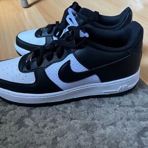 Kids black and white Air Force 1 shoes